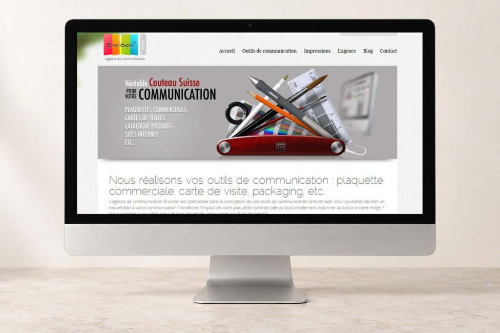 Site Envision Print présenté sur un ordinateur — réalisation web