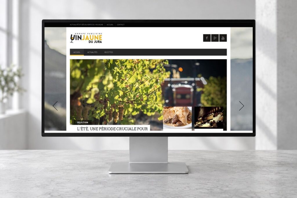 Site Vin jaune du Jura présenté sur un ordinateur — réalisation web