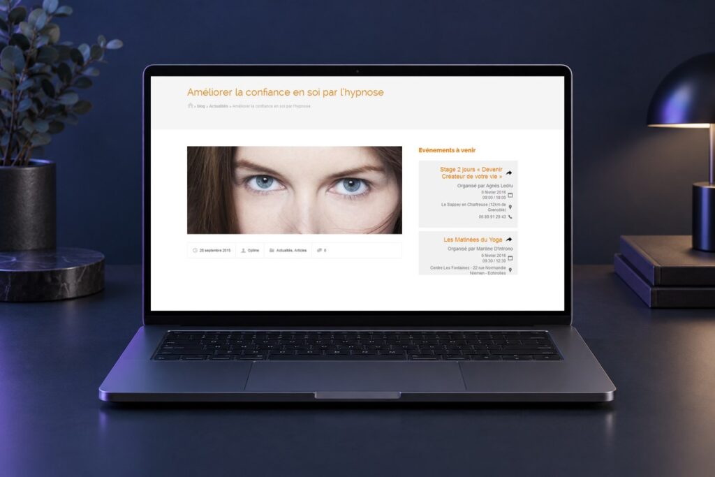 Site Association Optime présenté sur un ordinateur — réalisation web