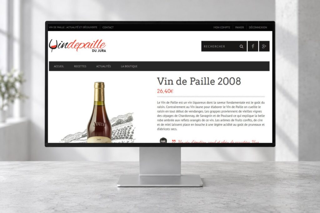 Site Vin de paille présenté sur un ordinateur — réalisation web