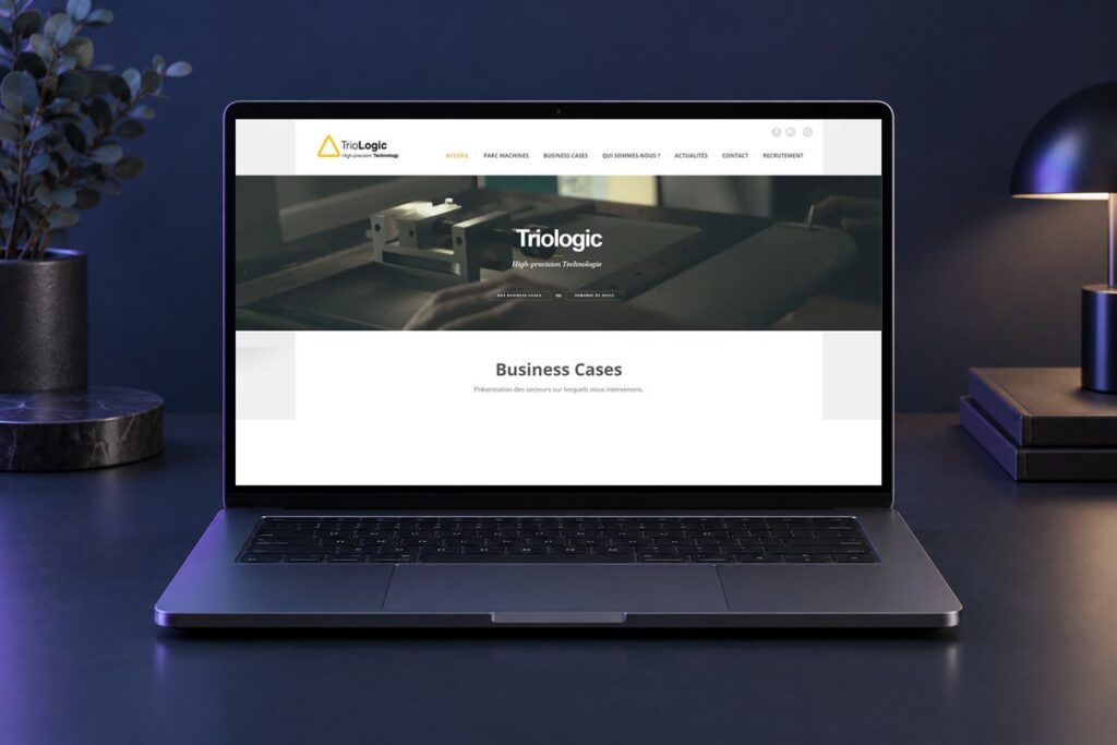 Site Triologic présenté sur un ordinateur — réalisation web
